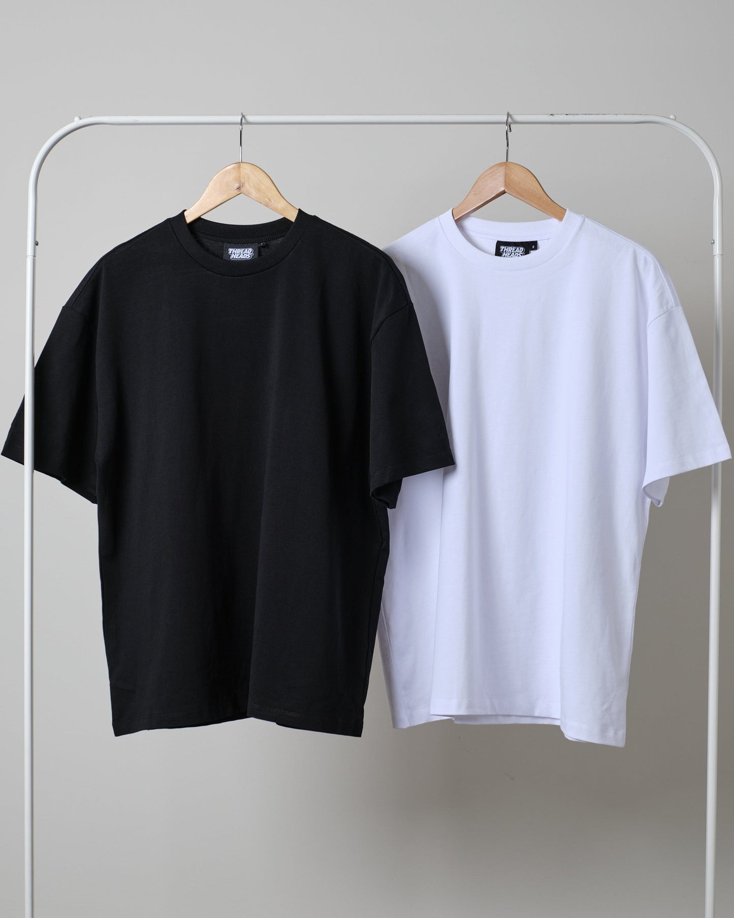 Pack of two plain oversize drop shoulder t-shirts (white - black)
